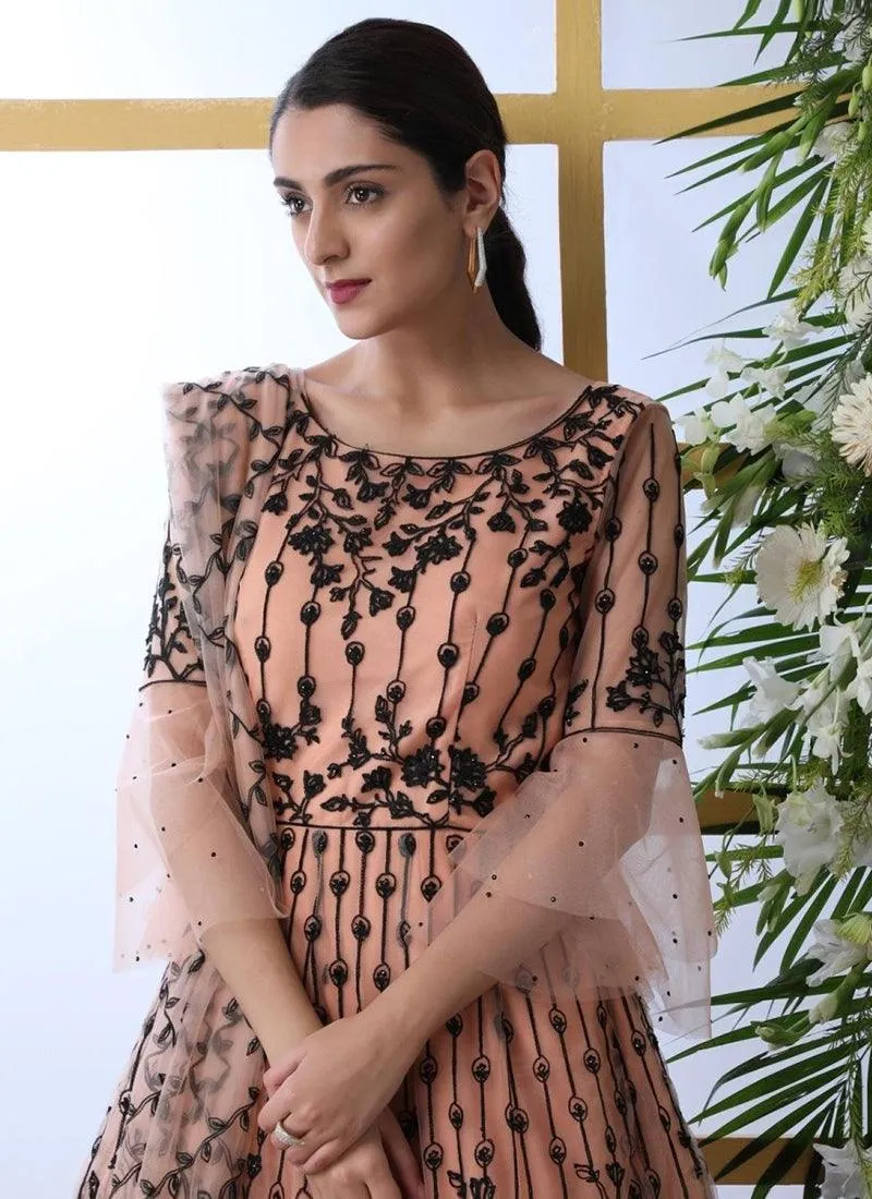 Sensational Peach Colored Soft Net Base Festive Wear Designer Gown